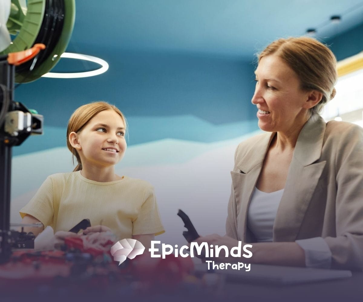 A BCBA and autistic child sitting in a creative space, talking and conducting autism evaluation in North Carolina.